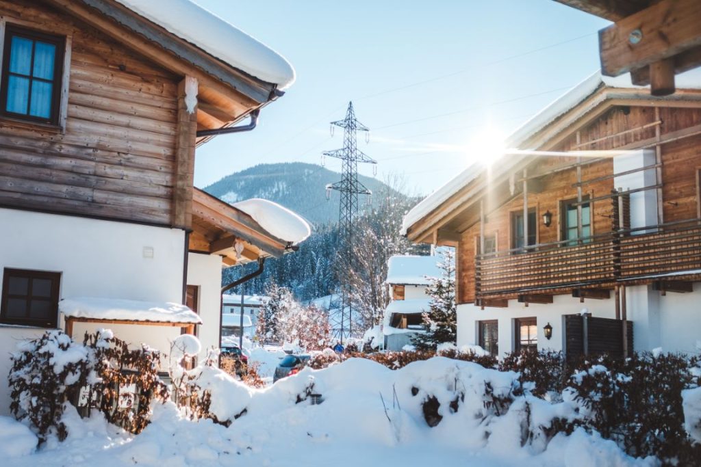 houses in winter with snow