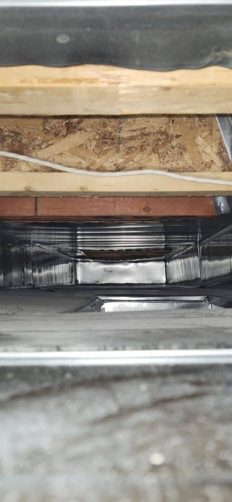 Inside ductwork during duct cleaning
