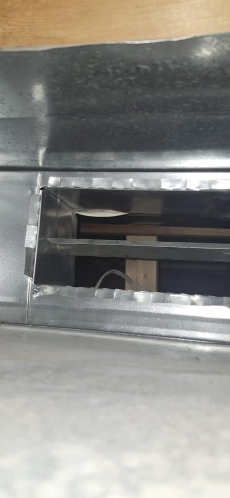 Inside ductwork during duct cleaning