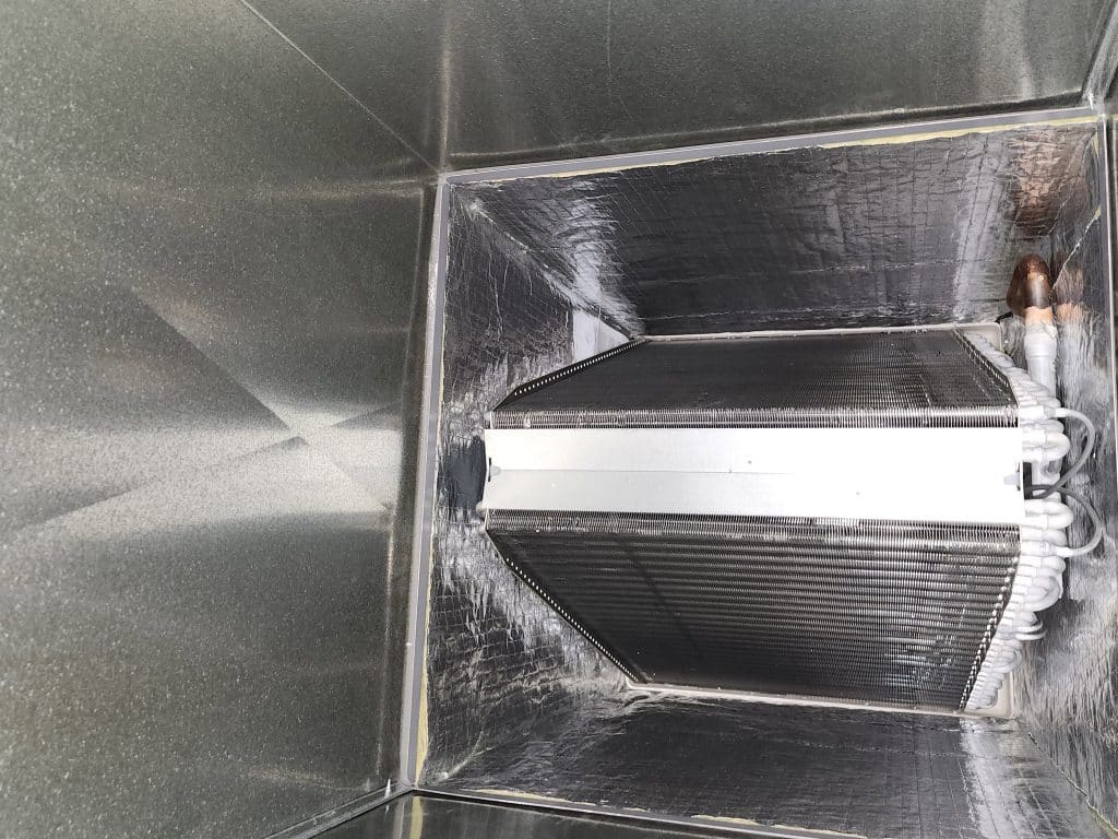 Inside ductwork during duct cleaning