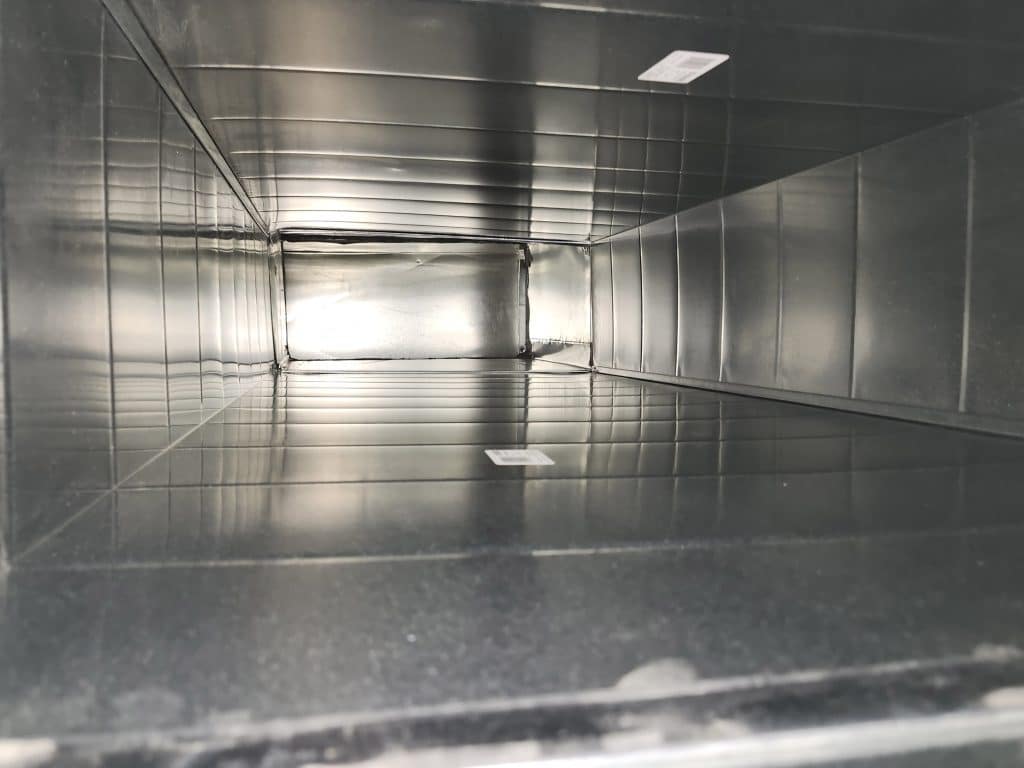 Inside ductwork during duct cleaning