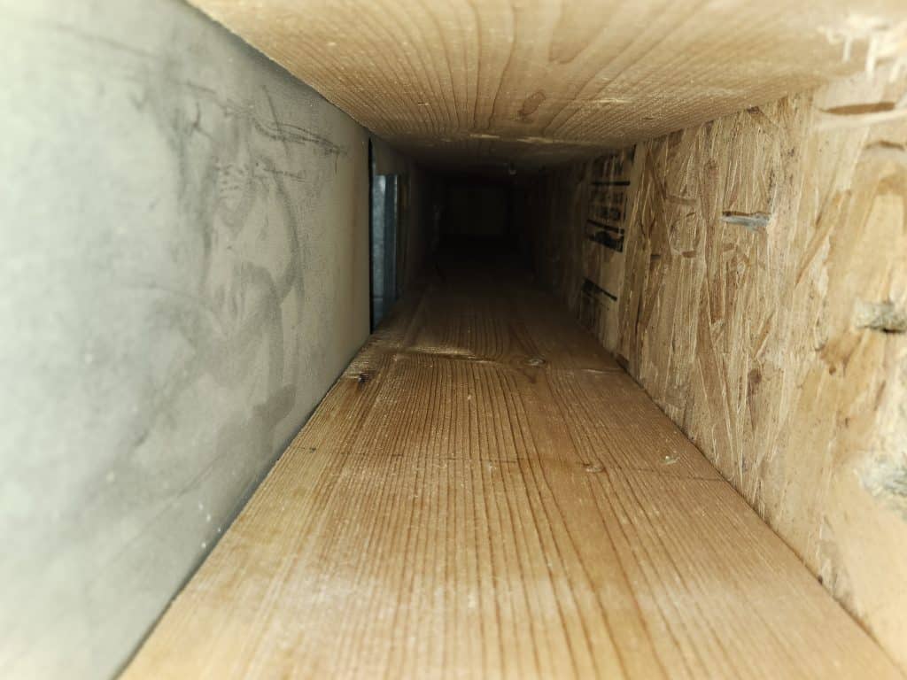 Inside ductwork during duct cleaning