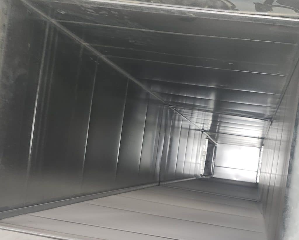 Inside ductwork during duct cleaning