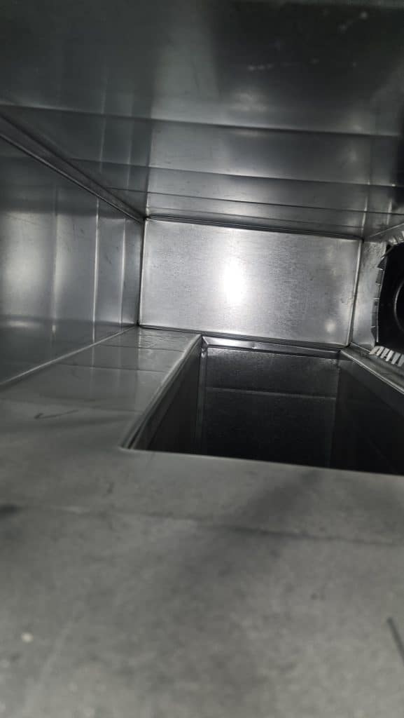Inside ductwork during duct cleaning