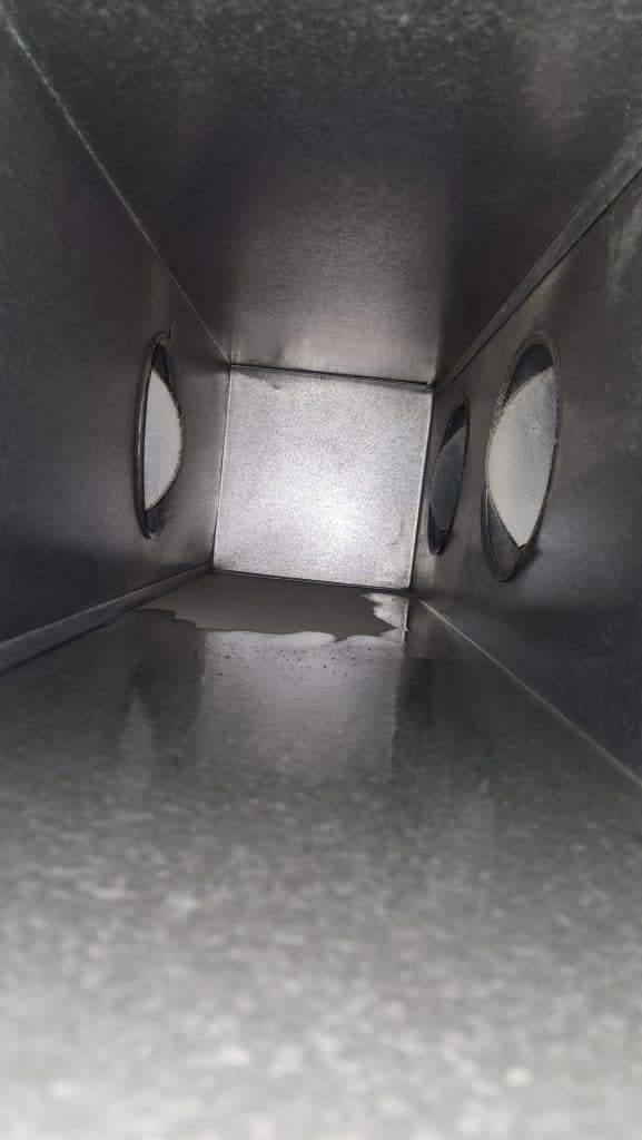 Inside ductwork during duct cleaning
