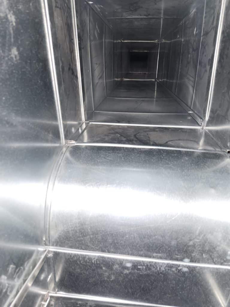 Inside ductwork during duct cleaning