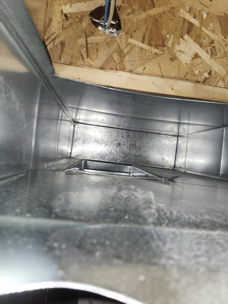 Inside ductwork during duct cleaning