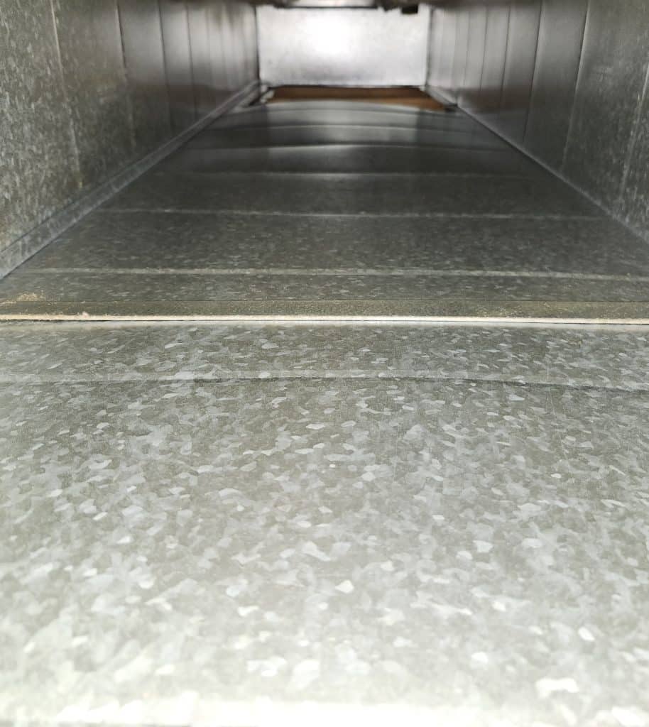 Inside ductwork during duct cleaning