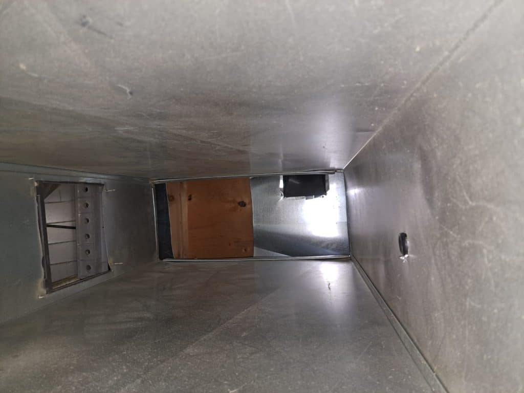 Inside ductwork during duct cleaning