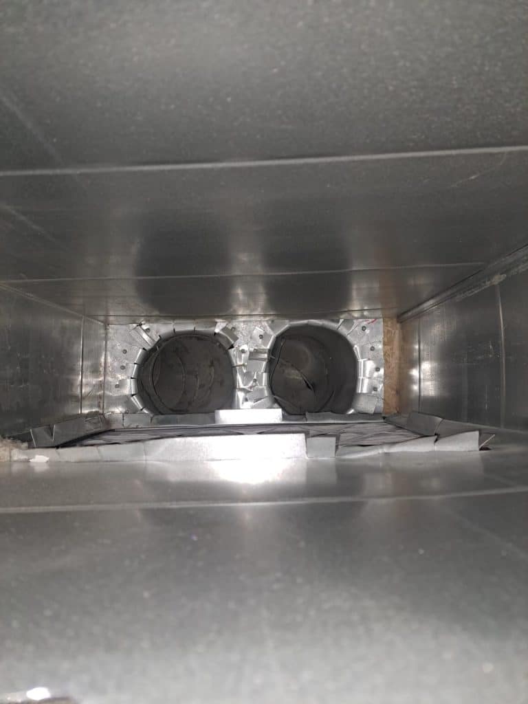 Inside ductwork during duct cleaning