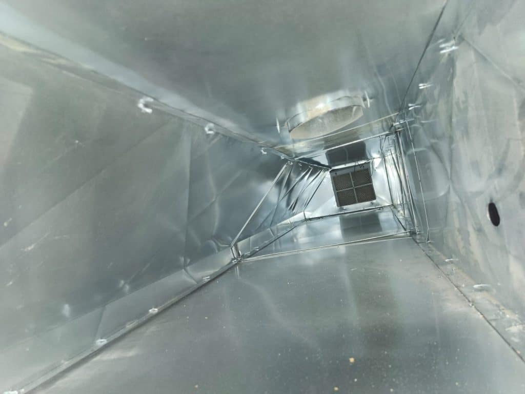 Inside ductwork during duct cleaning