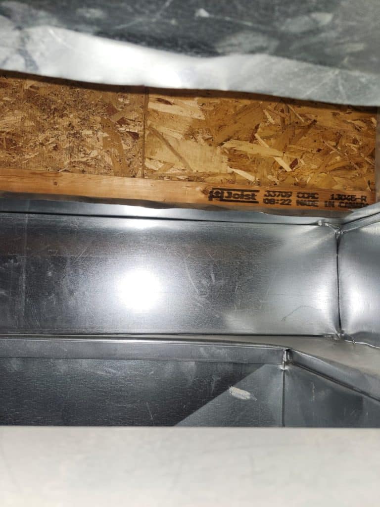 Inside ductwork during duct cleaning
