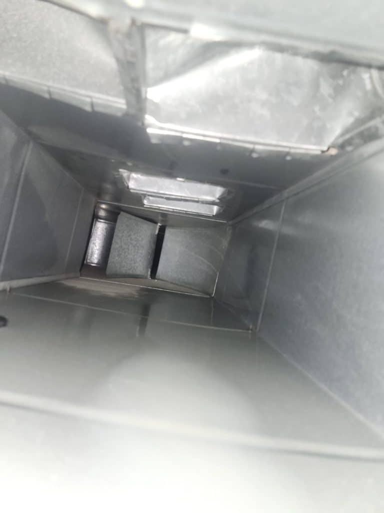Inside ductwork during duct cleaning