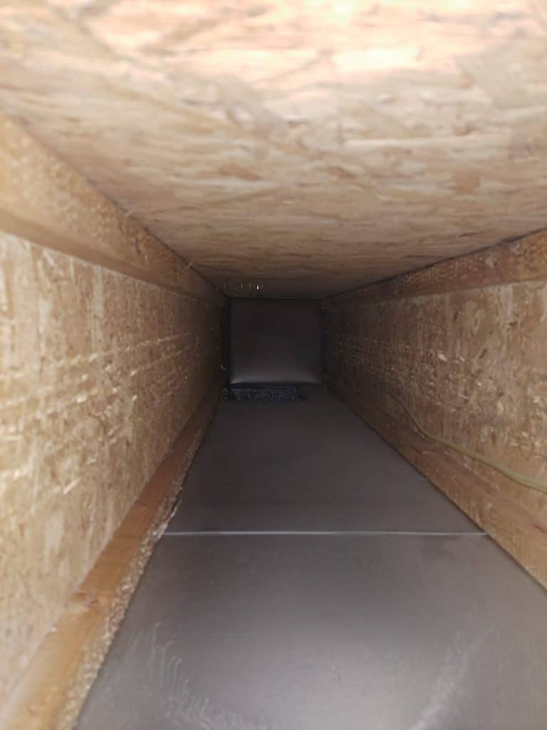 Inside ductwork during duct cleaning