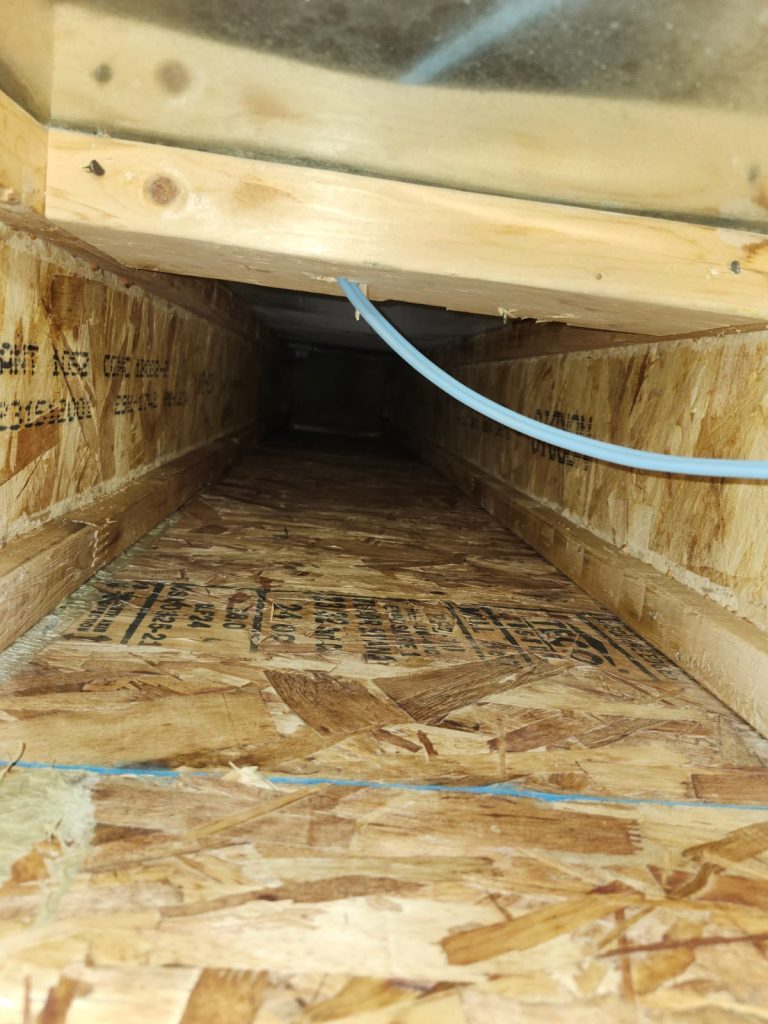 Inside ductwork during duct cleaning