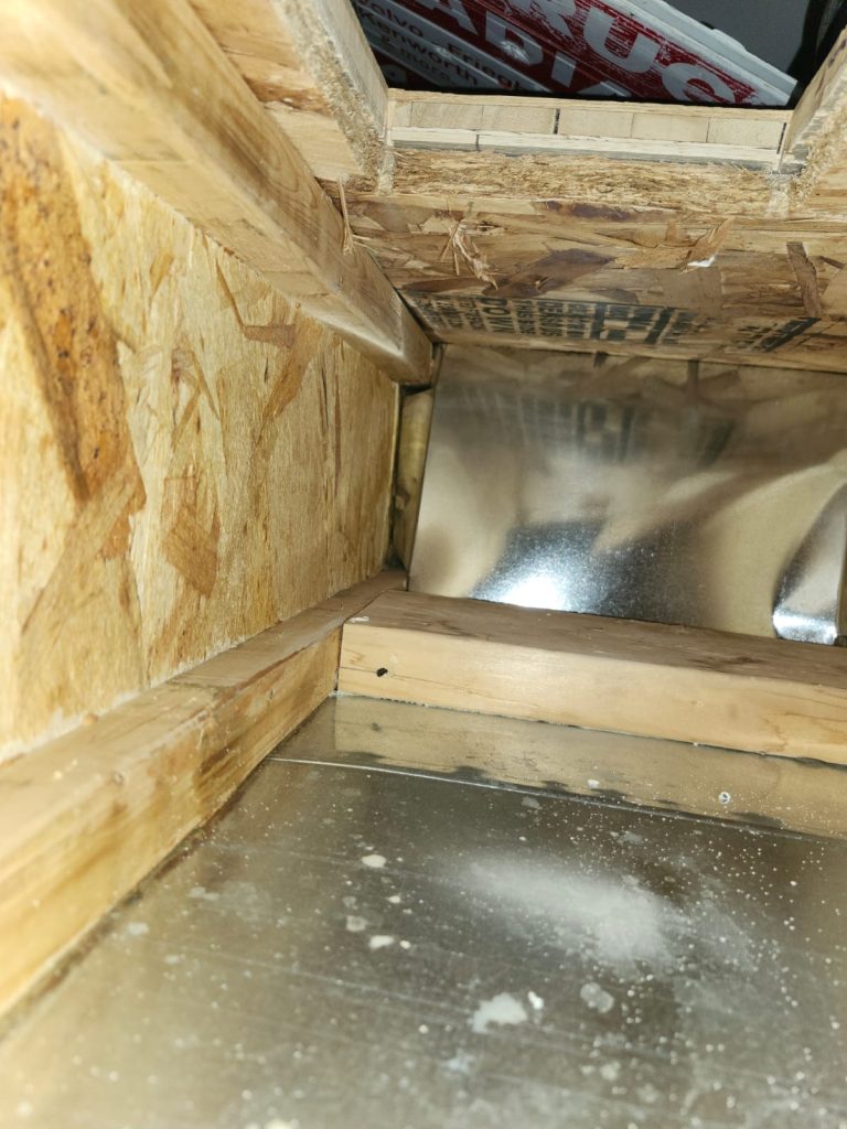 Inside ductwork during duct cleaning