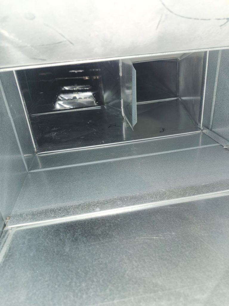 Inside ductwork during duct cleaning
