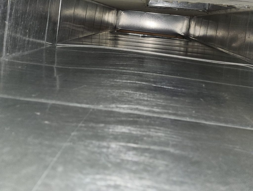 Inside ductwork during duct cleaning