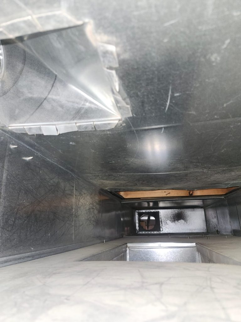 Inside ductwork during duct cleaning