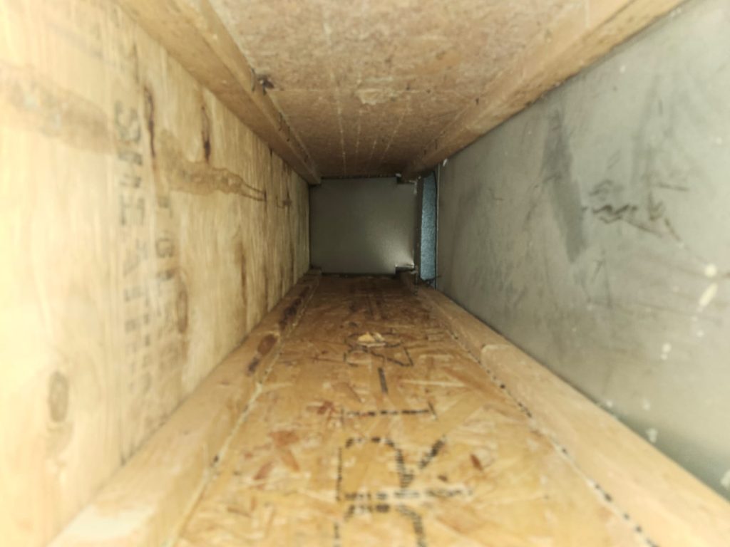 Inside ductwork during duct cleaning