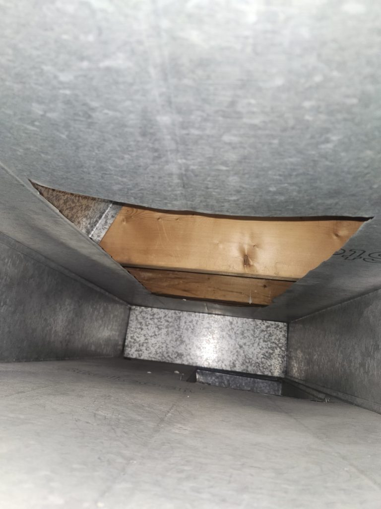 Inside ductwork during duct cleaning