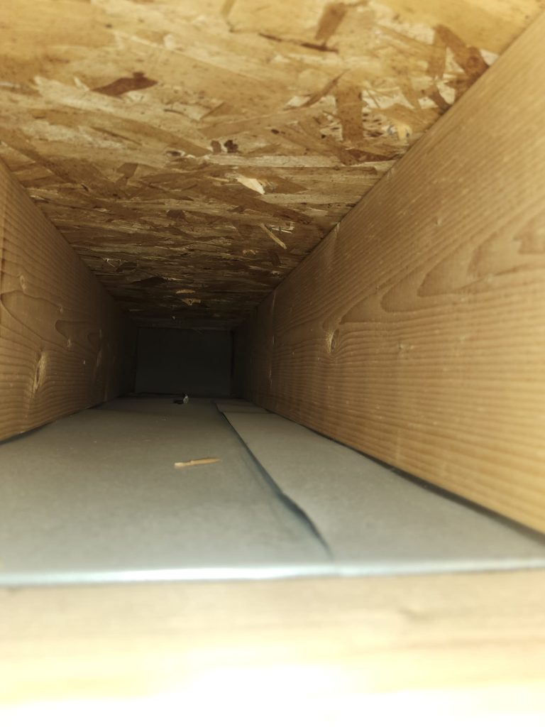 Inside ductwork during duct cleaning