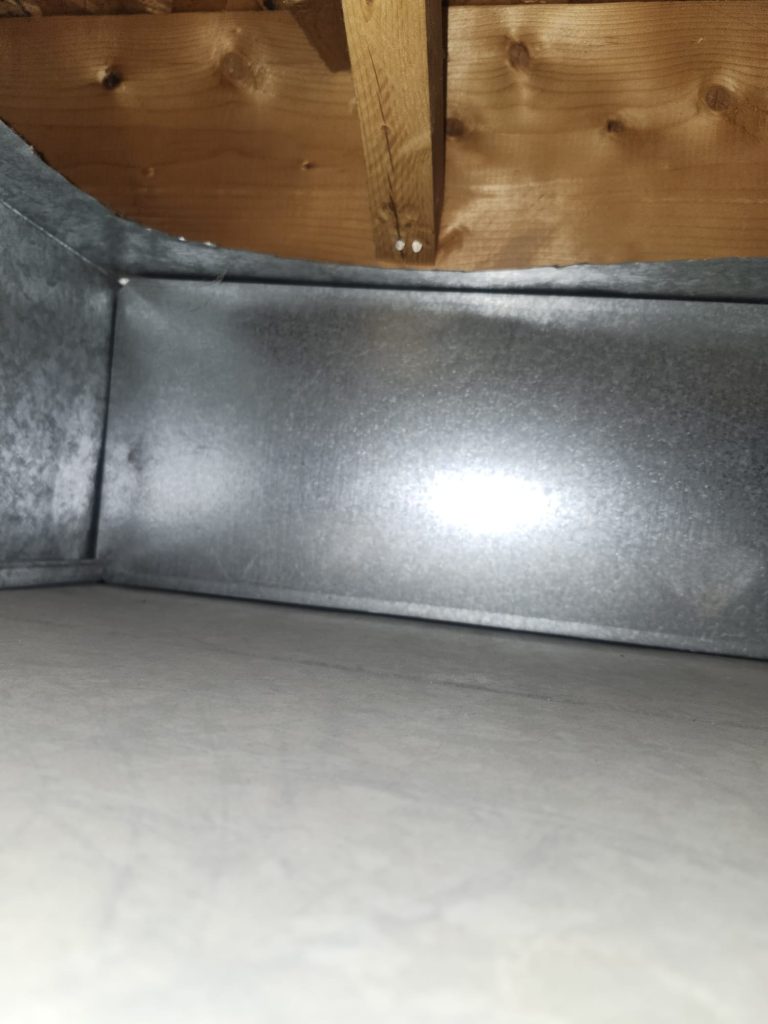 Inside ductwork during duct cleaning