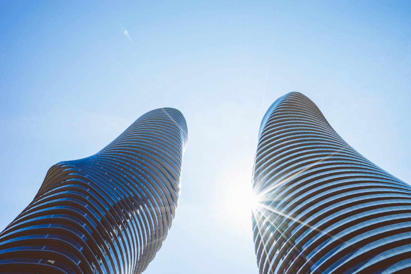 Looking up at the curved twin Absolute World towers, the 'Marilyn Monroe Towers,' in Mississauga