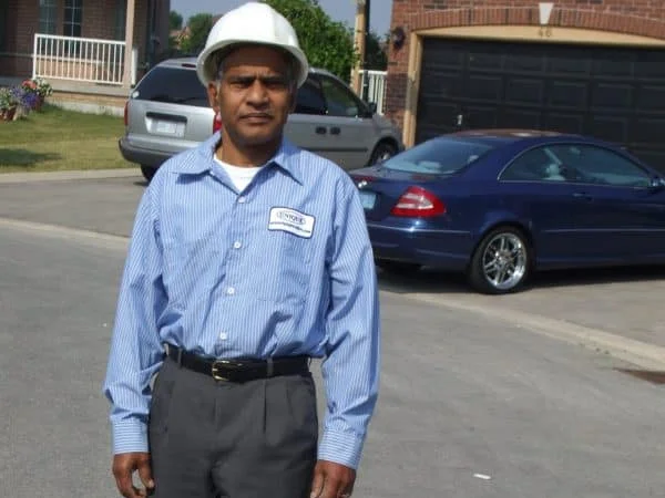 A duct cleaning technician arriving at a home